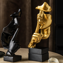 Escultura do Silêncio - Silence is Gold