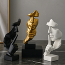 Escultura do Silêncio - Silence is Gold