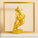 Escultura do Silêncio - Silence is Gold