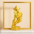 Escultura do Silêncio - Silence is Gold